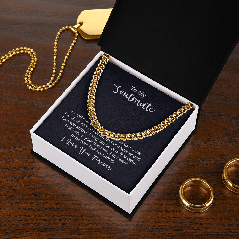 Gold chain necklace in gift box labeled 'To My Soulmate' with gold rings and a pendant nearby